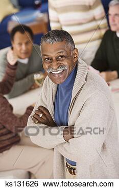 Stock Photo - smiling man with 
arms crossed. 
fotosearch - search 
stock photos, 
pictures, images, 
and photo clipart