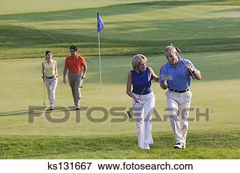 Picture - couples playing 
golf. fotosearch 
- search stock 
photos, pictures, 
images, and photo 
clipart