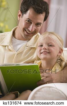 Stock Photo - father and daughter 
reading together. 
fotosearch - search 
stock photos, 
pictures, images, 
and photo clipart