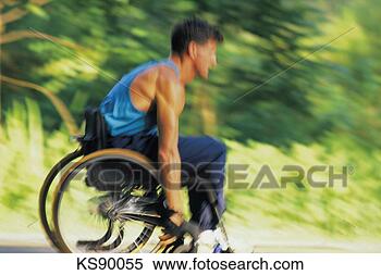 Stock Image - man racing in 
wheelchair, blurred 
motion. fotosearch 
- search stock 
photos, pictures, 
images, and photo 
clipart