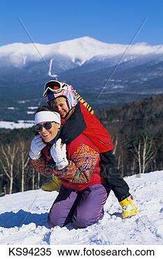 Stock Image - family skiing, 
 white mtn nat'l 
forest,  bretton 
woods ski area. 
fotosearch - search 
stock photos, 
pictures, images, 
and photo clipart