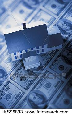 Stock Photo - model house on 
top of money, 
aerial shot. fotosearch 
- search stock 
photos, pictures, 
images, and photo 
clipart
