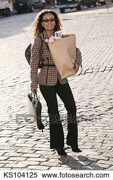 Stock Image - woman with grocery 
bag, portrait. 
fotosearch - search 
stock photos, 
pictures, images, 
and photo clipart