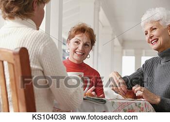 Stock Photo - women eating. 
fotosearch - search 
stock photos, 
pictures, images, 
and photo clipart