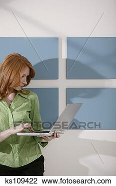 Stock Photo - businesswoman 
with laptop computer. 
fotosearch - search 
stock photos, 
pictures, images, 
and photo clipart