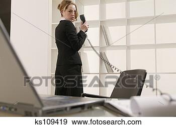 Stock Photograph - woman on telephone. 
fotosearch - search 
stock photos, 
pictures, images, 
and photo clipart