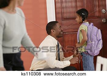 Stock Photo - dad seeing daughter 
off to school. 
fotosearch - search 
stock photos, 
pictures, images, 
and photo clipart