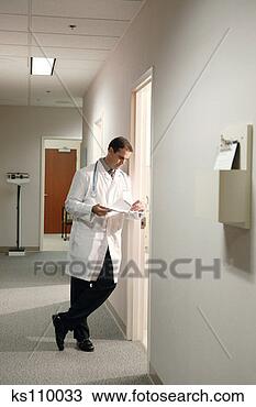 Stock Photo - doctor standing 
outside of examining 
room. fotosearch 
- search stock 
photos, pictures, 
images, and photo 
clipart