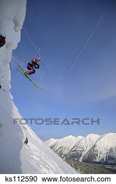 Stock Photography - man alpine skiing, 
bc canada. fotosearch 
- search stock 
photos, pictures, 
images, and photo 
clipart