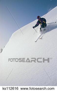 Stock Photo - man skiing in 
alberta, canada. 
fotosearch - search 
stock photos, 
pictures, images, 
and photo clipart