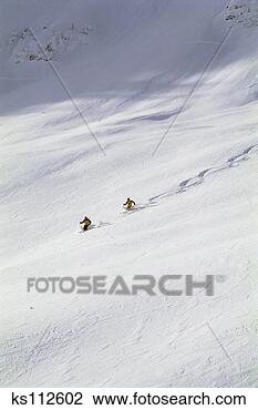 Stock Photo - two men powder 
skiing bc, canada. 
fotosearch - search 
stock photos, 
pictures, images, 
and photo clipart