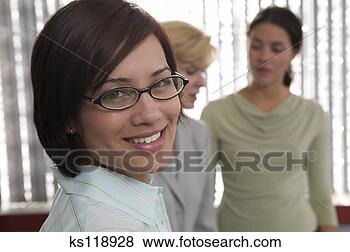 Stock Photo - portrait of a 
business woman, 
 two business 
women conversing 
in. fotosearch 
- search stock 
photos, pictures, 
images, and photo 
clipart