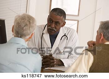 Picture - doctor conversing 
with patients. 
fotosearch - search 
stock photos, 
pictures, images, 
and photo clipart