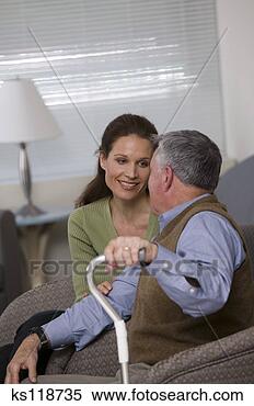 Stock Image - father and daughter 
waiting at doctor's 
office. fotosearch 
- search stock 
photos, pictures, 
images, and photo 
clipart