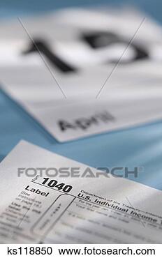 Stock Photography - 1040 tax forms 
and calendar page. 
fotosearch - search 
stock photos, 
pictures, images, 
and photo clipart