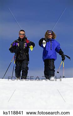 Stock Photography - two children skiing. 
fotosearch - search 
stock photos, 
pictures, images, 
and photo clipart