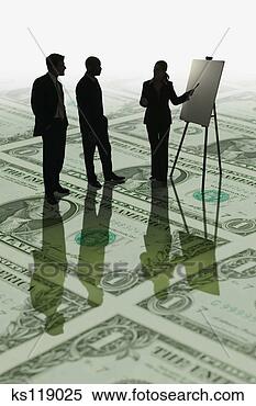 Stock Image - business team 
standing on dollar 
bills during a 
presentation. 
fotosearch - search 
stock photos, 
pictures, images, 
and photo clipart