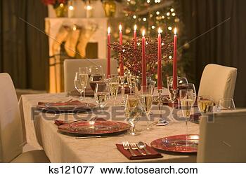 Picture - table set for 
christmas dinner. 
fotosearch - search 
stock photos, 
pictures, images, 
and photo clipart