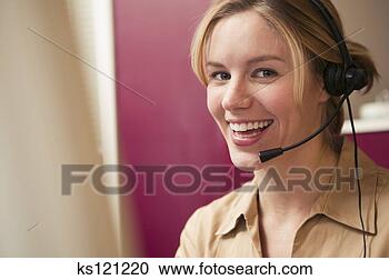 Stock Photography - telemarketer using 
a telephone headset, 
portrait. fotosearch 
- search stock 
photos, pictures, 
images, and photo 
clipart