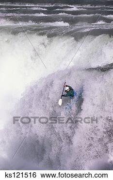 Stock Photo - man kayaking over 
kootenai falls, 
montana, usa. 
fotosearch - search 
stock photos, 
pictures, images, 
and photo clipart
