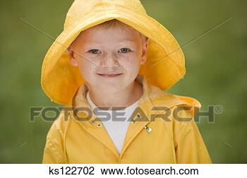 Stock Photo - little boy wearing 
rain gear, portrait. 
fotosearch - search 
stock photos, 
pictures, images, 
and photo clipart