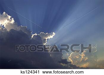 Stock Photography - sun rays accentuated 
by stormy cumulus 
clouds. fotosearch 
- search stock 
photos, pictures, 
images, and photo 
clipart