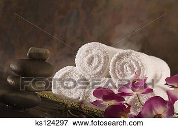 Picture - towels, flowers, 
and stones. fotosearch 
- search stock 
photos, pictures, 
images, and photo 
clipart