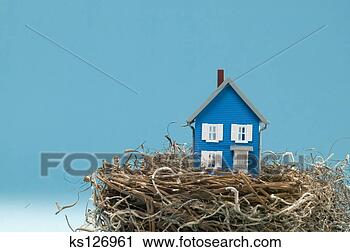 Stock Photography - model house in 
bird nest. fotosearch 
- search stock 
photos, pictures, 
images, and photo 
clipart