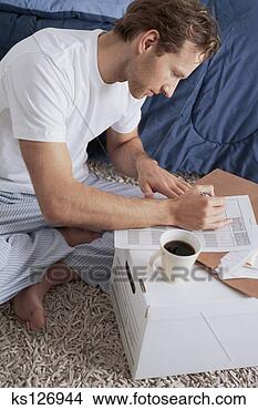 Banco de Imagem - pijamas,  trabalhando, 
 paperwork. fotosearch 
- busca de fotos, 
imagens e clipart