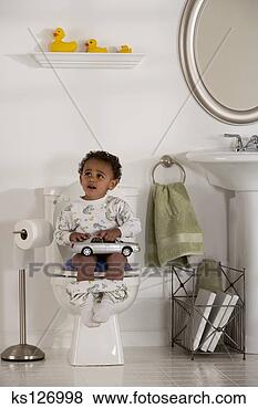 Stock Photo - toddler boy potty-training. 
fotosearch - search 
stock photos, 
pictures, images, 
and photo clipart