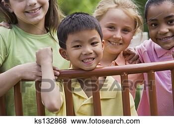 Stock Photo - smiling boy with 
friends. fotosearch 
- search stock 
photos, pictures, 
images, and photo 
clipart