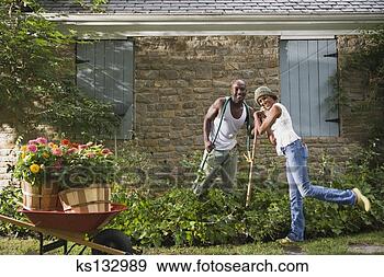 Stock Photograph - couple gardening. 
fotosearch - search 
stock photos, 
pictures, images, 
and photo clipart
