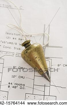 Stock Photo - plumb bob lying 
on blueprint. 
fotosearch - search 
stock photos, 
pictures, images, 
and photo clipart