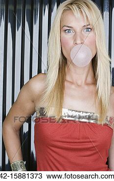 Stock Photo - woman blowing 
bubble gum bubble. 
fotosearch - search 
stock photos, 
pictures, images, 
and photo clipart
