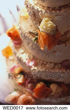 Picture - roses on wedding 
cake. fotosearch 
- search stock 
photos, pictures, 
images, and photo 
clipart