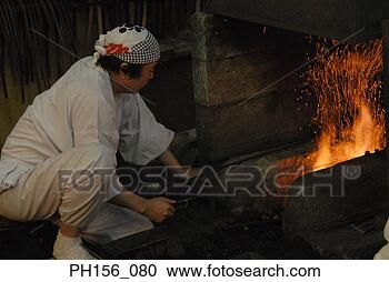 Stock Photography - side profile of 
a blacksmith crouching 
near a furnace. 
fotosearch - search 
stock photos, 
pictures, images, 
and photo clipart