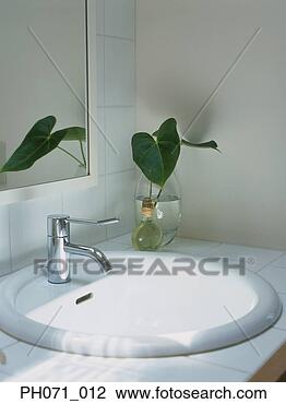 Stock Photo - bathroom sink, 
close-up. fotosearch 
- search stock 
photos, pictures, 
images, and photo 
clipart