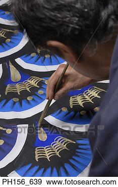 Stock Photograph - close-up of a 
painter painting. 
fotosearch - search 
stock photos, 
pictures, images, 
and photo clipart