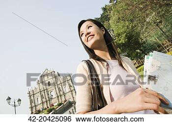Stock Photo - tourist standing 
near the ruins 
of sao paulo. 
fotosearch - search 
stock photos, 
pictures, images, 
and photo clipart