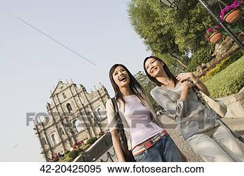 Stock Image - tourists walking 
in front of the 
ruins of sao paulo. 
fotosearch - search 
stock photos, 
pictures, images, 
and photo clipart
