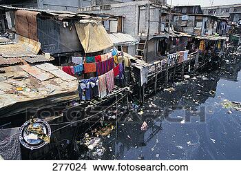 Stock Photo - shantytown, manila,  philippines. fotosearch  - search stock  photos, pictures,  images, and photo  clipart