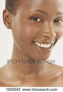 Stock Photo - close-up of a 
smiling woman 
with cropped hair. 
fotosearch - search 
stock photos, 
pictures, images, 
and photo clipart