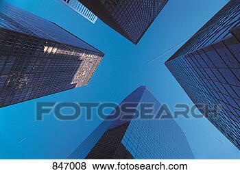 Stock Photo - low angle view 
of skyscrapers 
in a city. fotosearch 
- search stock 
photos, pictures, 
images, and photo 
clipart