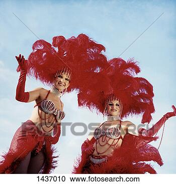 Stock Photography - two chorus girls 
standing side 
by side in their 
stage costumes. 
fotosearch - search 
stock photos, 
pictures, images, 
and photo clipart