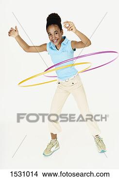 Stock Photo - young girl plays 
with two hoops. 
fotosearch - search 
stock photos, 
pictures, images, 
and photo clipart