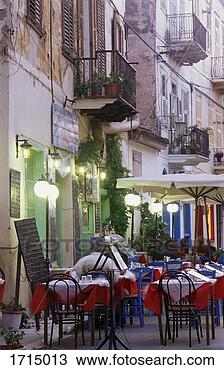 Stock Photo - outdoor cafe in 
nafplio, pelopennese, 
greece. fotosearch 
- search stock 
photos, pictures, 
images, and photo 
clipart