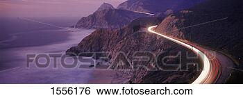 Stock Photo - light trails on 
a coastal highway 
at dusk, california, 
usa. fotosearch 
- search stock 
photos, pictures, 
images, and photo 
clipart