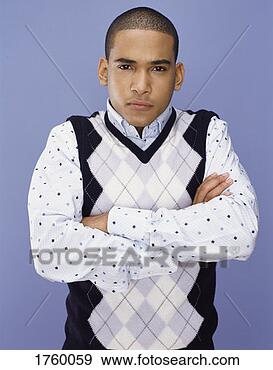 Stock Photograph - portrait of a 
sulking man with 
his arms crossed. 
fotosearch - search 
stock photos, 
pictures, images, 
and photo clipart