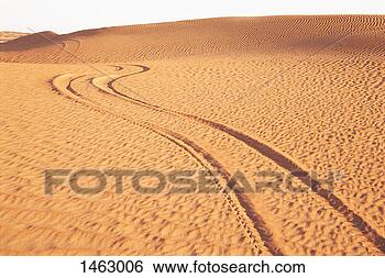 Stock Photo - parallel lines 
of tyre tracks 
diminish to vanishing 
point. fotosearch 
- search stock 
photos, pictures, 
images, and photo 
clipart