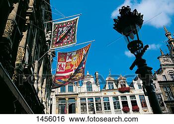 Stock Photo - streetlight,  
building exteriors 
and flags,  grand 
place,  brussels. 
fotosearch - search 
stock photos, 
pictures, images, 
and photo clipart